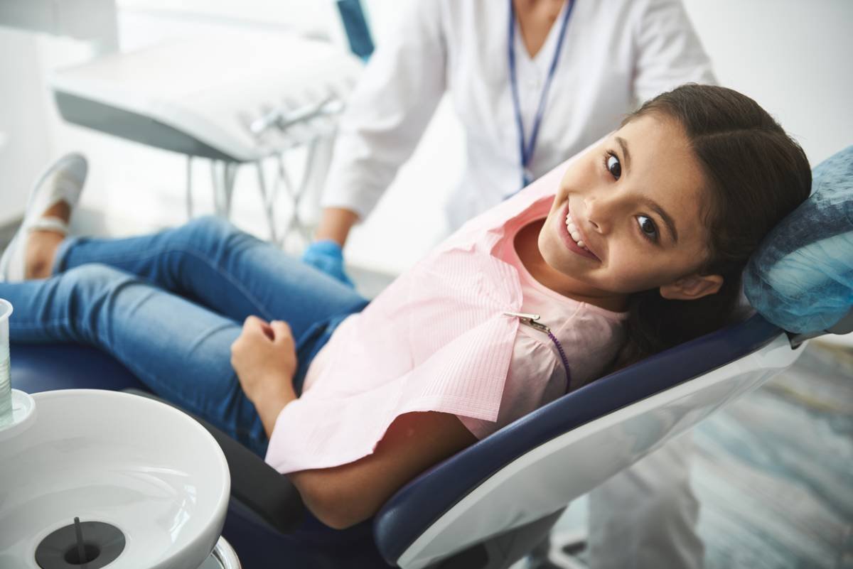 concept of calm child at the dentist